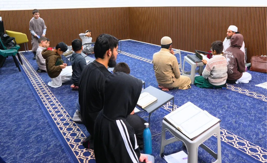 Students and teachers gathered on the carpet for revision